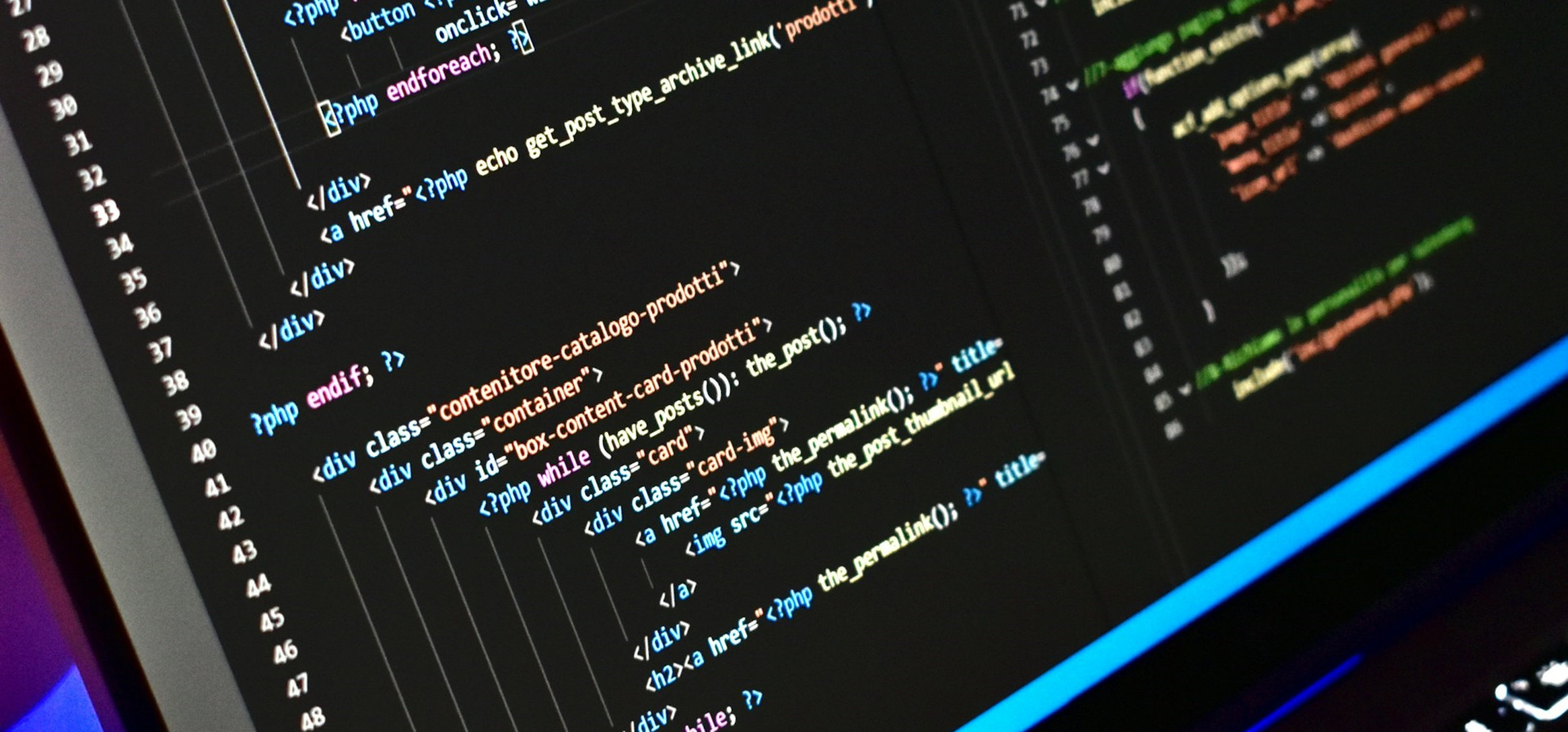 A laptop screen with code